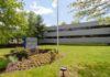 Branchburg office building reaches full occupancy with speakers bureau lease