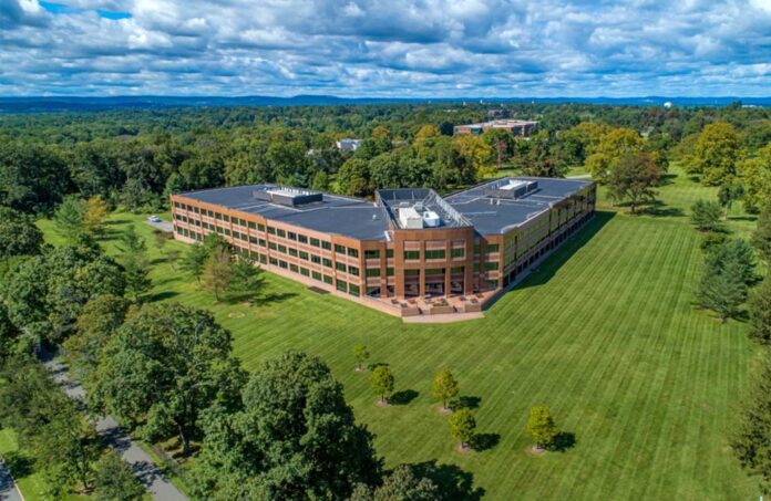 Bergman Real Estate Group says 7 Giralda Farms in Madison has reached 100% occupancy